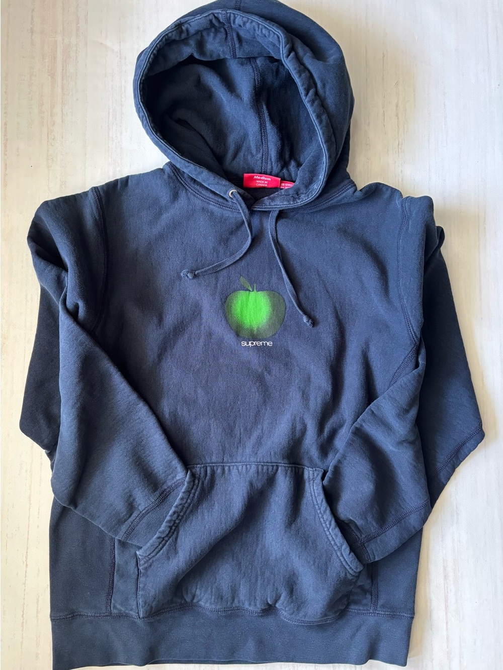 Supreme Men’s Navy Hoodie with Green Apple Graphic Size M Very Good Condition